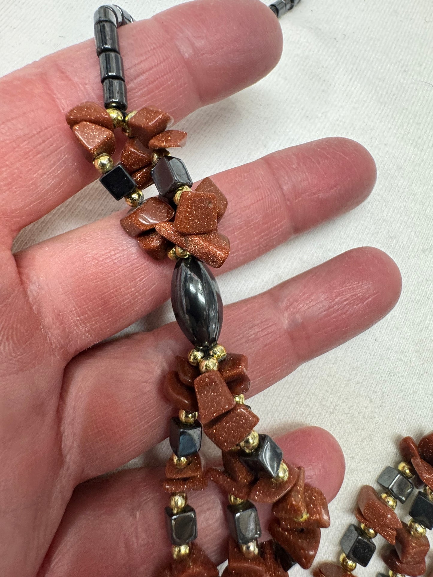 Hematite and Goldstone Drop Necklace