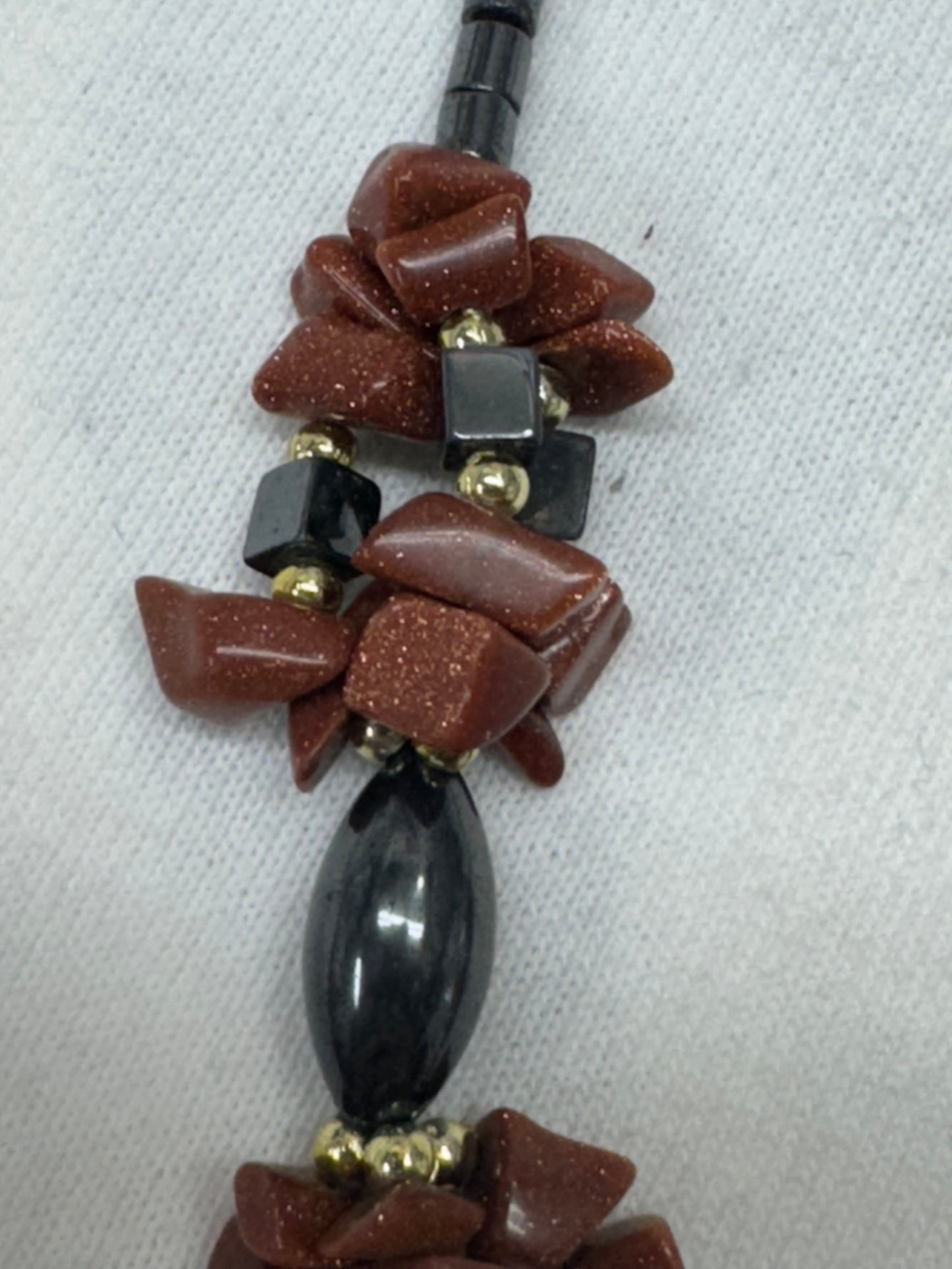 Hematite and Goldstone Drop Necklace