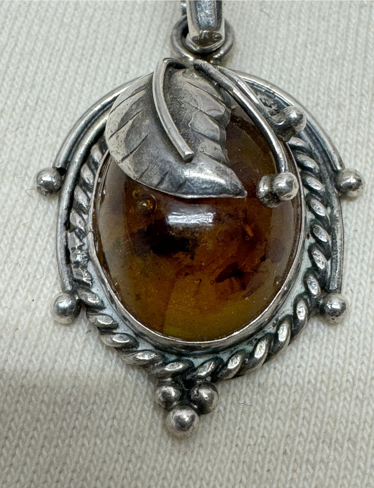 Amber and Sterling Feather Pendant